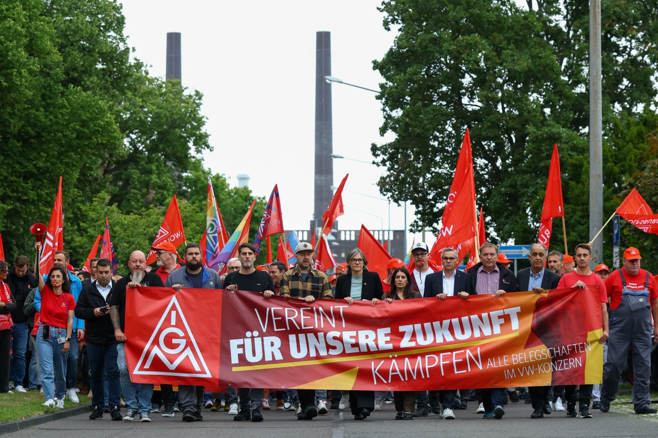 Volkswagen employees and union members rallied at the company’s headquarters when its supervisory board met on July 9. Volkswagen employees and union members rallied at the company’s headquarters when its supervisory board met on July 9.