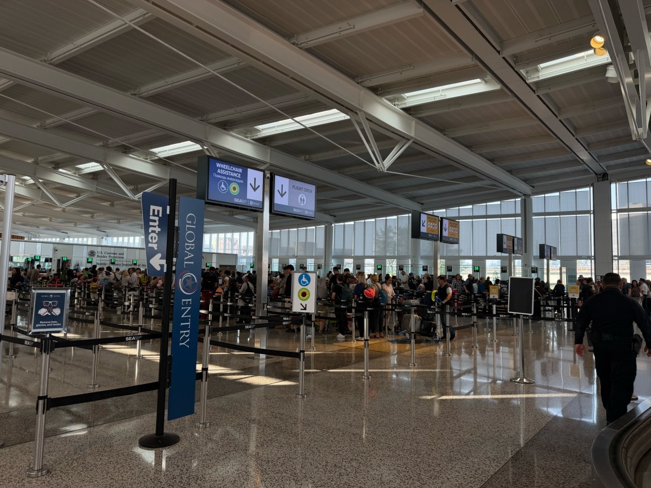 Global Entry at Seattle-Tacoma International Airport. The long line is for people without the status. Global Entry at Seattle-Tacoma International Airport. The long line is for people without the status.