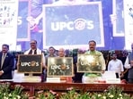 Uttar Pradesh Chief Minister Yogi Adityanath, along with State Deputy Chief Ministers Brajesh Pathak and Keshav Prasad Maurya, poses for a photo at the launch of Uttar Pradesh Corporation for Outsourced Services (UPCOS), in Lucknow on Wednesday.