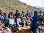 Ladakh lieutenant governor Vinai Kumar Saxena interacts with officials to review ongoing tourism development initiatives during his visit to the historic heritage village of Hunderman near the Line of Control (LoC), in Kargil on Thursday. (ANI Photo)