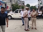 Police at the incident site in Yamunanagar’s high-security Model Town area on Thursday. (HT Photo)