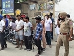 Police investigating at the spot after a tractor-trolley driver mowed down a girl to death and injured other in Jagraon on Wednesday. (HT Photo)