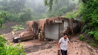 Mudslide flowing over a shop following heavy rainfall near Jabli in Solan district on Thursday. The IMD has issued a yellow alert for Solan for September 5. (HT) Mudslide flowing over a shop following heavy rainfall near Jabli in Solan district on Thursday. The IMD has issued a yellow alert for Solan for September 5. (HT)
