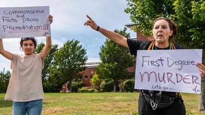 Demonstrators call for a first degree murder verdict as they protest outisde the courthouse during the jury deliberation phase of Lindsay Clancy's murder trial at the Plymouth County Superior Court in Plymouth, Massachusetts, on September 2, 2026. Lindsay Clancy is on trial for the January 2023 strangulation deaths of her three young children. (Photo by JOSEPH PREZIOSO / AFP) (AFP)