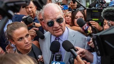 Lindsay Clancy'ss defense attorney Kevin Reddington is surrounded by reporters while leaving the Plymouth Superior Court during the jury deliberation phase of Lindsay Clancy's murder trial in Plymouth, Massachusetts, on September 2, 2026. (Photo by JOSEPH PREZIOSO / AFP) (AFP)