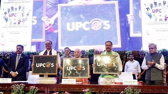 Uttar Pradesh Chief Minister Yogi Adityanath, along with State Deputy Chief Ministers Brajesh Pathak and Keshav Prasad Maurya, poses for a photo at the launch of Uttar Pradesh Corporation for Outsourced Services (UPCOS), in Lucknow on Wednesday. (@myogiadityanath X)