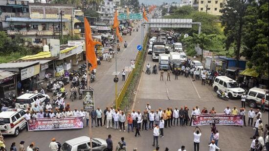 Karad: Members of the Maratha community hold banners and block traffic on the Karad-Chiplun highway in support of quota activist Manoj Jarange Patil's hunger strike, in Karad, Maharashtra, Thursday, Sept. 3, 2026. (PTI)