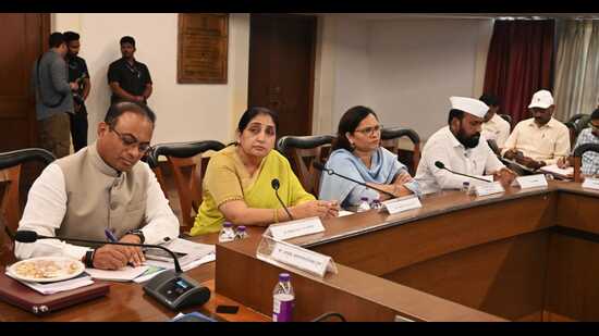 Pawar (L) chaired a meeting with senior officials of Pune and Pimpri-Chinchwad, including Pune divisional commissioner Sheetal Teli-Ugale. (HT)