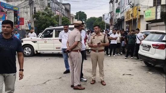 Police at the incident site in Yamunanagar’s high-security Model Town area on Thursday. (HT Photo)