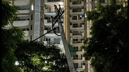 Residents blamed poor street lighting for the pole crash, while DHBVN said underground fault detection delayed restoration. (HT)