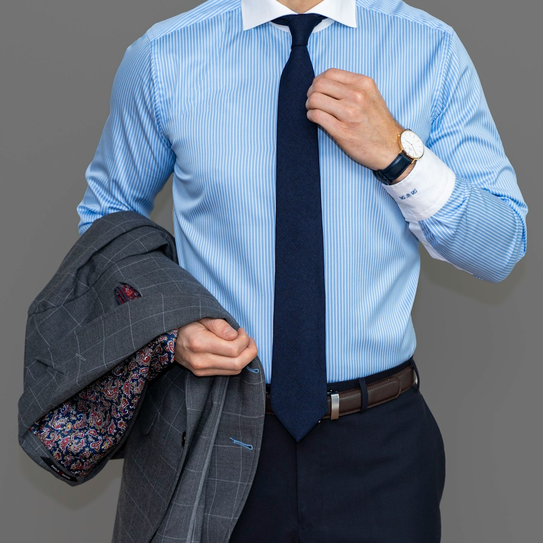 A white or light-blue shirt remains a wardrobe essential. (Unsplash)