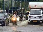 Hundreds of commuters were stranded for hours after heavy rain triggered severe waterlogging and a 10-km traffic jam on the Delhi-Gurugram Expressway. (ANI Video Grab)