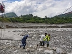 Nuwakot: Workers pull ropes as people use a makeshift zipline to cross the Trishuli river from Koloni in the aftermath of the recent flash floods, in Nuwakot district, Nepal, Friday, Sept. 4, 2026. (PTI Photo/Karma Bhutia) (PTI09_04_2026_000065B) (PTI)