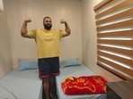 Tajinder Pal Singh Toor in the shipping container in Patiala which is a replica of the unique accommodation awaiting athletes at the Aichi-Nagoya Asian Games. (HT)