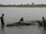 The incident occurred around 6 pm on Tuesday when a boat carrying five army personnel moving downstream near the barrage gates got caught in a powerful current and capsized. (HT File)