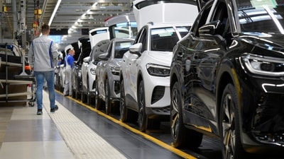 Technicians work at the production line for electric car models of the Volkswagen Group in Zwickau, Germany. (REUTERS/File Photo)