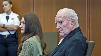 Lindsay Clancy and lawyer Kevin Reddington look at jurors at the Plymouth court on Friday, Sept. 4.