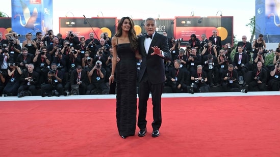 CORRECTION / Lawyer Amal Clooney and US actor George Clooney, attend the red carpet event ahead the screening of �Ink� and the Opening ceremony of the 83rd International Venice Film Festival, at Venice Lido on September 2, 2026. (Photo by Tiziana FABI / AFP) / �The erroneous mention[s] appearing in the metadata of this photo by Tiziana FABI has been modified in AFP systems in the following manner: [�Ink�] instead of ["Hink"]. Please immediately remove the erroneous mention[s] from all your online services and delete it (them) from your servers. If you have been authorized by AFP to distribute it (them) to third parties, please ensure that the same actions are carried out by them. Failure to promptly comply with these instructions will entail liability on your part for any continued or post notification usage. Therefore we thank you very much for all your attention and prompt action. We are sorry for the inconvenience this notification may cause and remain at your disposal for any further information you may require.�