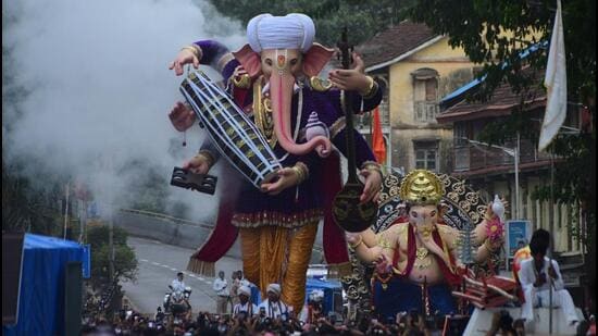 Ganpati idols make their way through city streets ahead of the 10-day festival. (HT Photo)