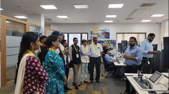 The delegation being briefed by the officials at the Vizhinjam International Seaport (HT Photo)
