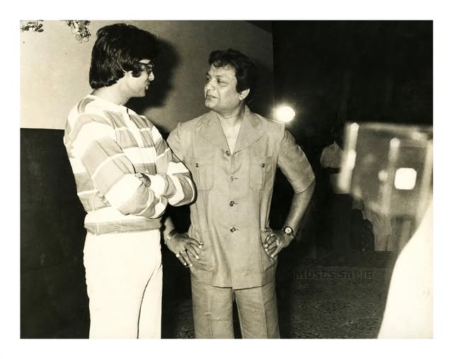 Uttam Kumar with Amitabh Bachchan on the sets of Desh Premee in 1977. Uttam Kumar with Amitabh Bachchan on the sets of Desh Premee in 1977.