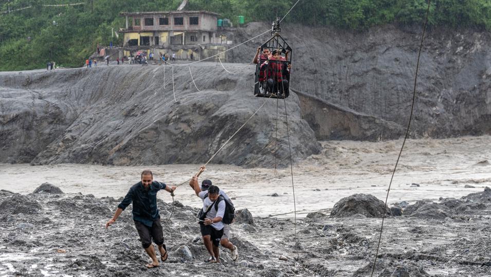 Residents pull a newly installed zipline to help people commute across the Trishuli river in the aftermath of flash floods at Bidur in Nepal’s Nuwakot district, Nepal, Wednesday, Sept. 2, 2026. (AP Photo/Rajesh Kumar Singh) (AP) Residents pull a newly installed zipline to help people commute across the Trishuli river in the aftermath of flash floods at Bidur in Nepal’s Nuwakot district, Nepal, Wednesday, Sept. 2, 2026. (AP Photo/Rajesh Kumar Singh) (AP)