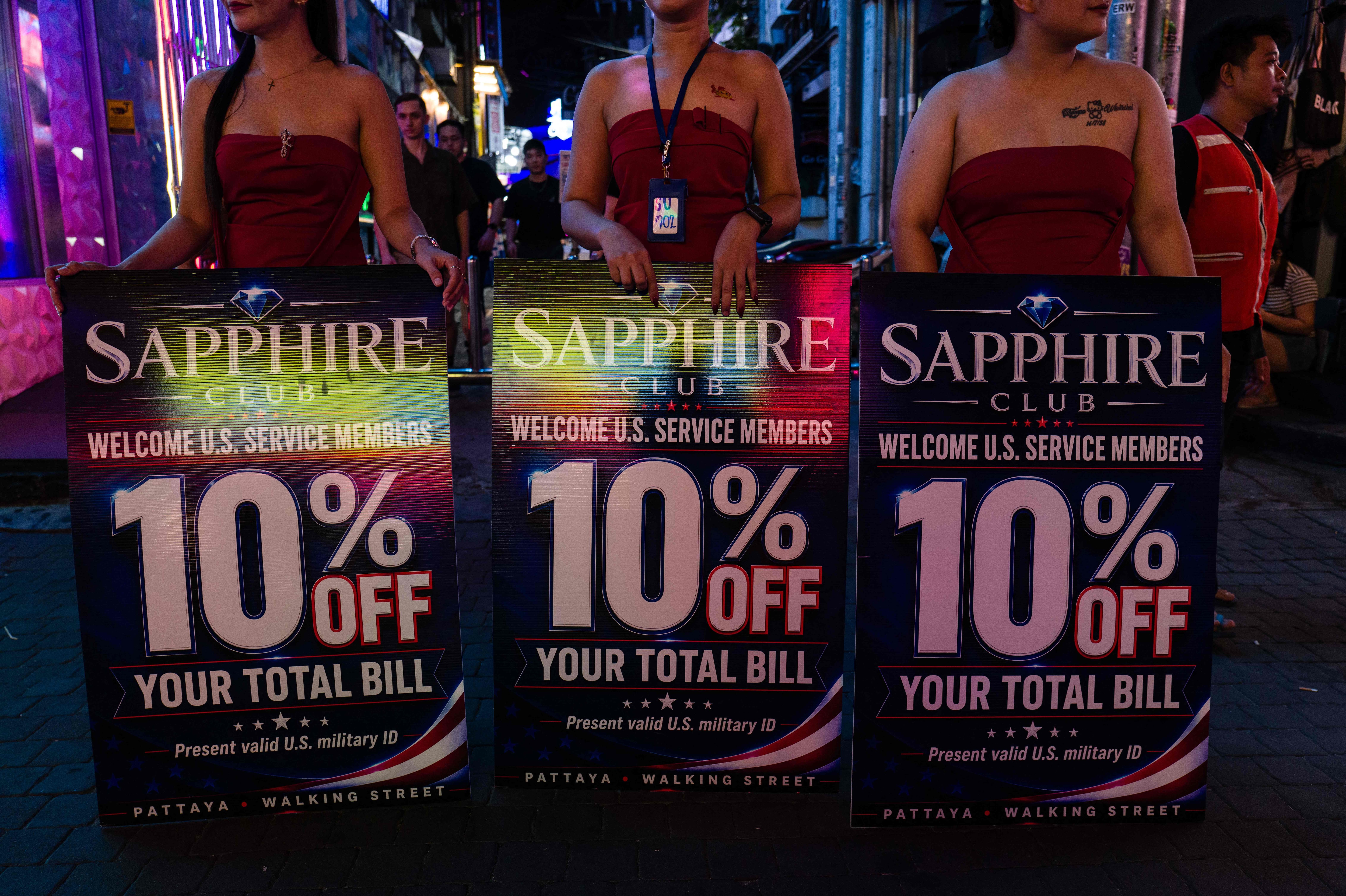Many local businesses in Pattaya have put up signs welcoming the sailors. (AFP)