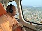 Chief minister Yogi Adityanath conducting an aerial survey of the flood situation in Varanasi on Saturday. (HT Photo)