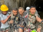 Members of the Nepal Army search and rescue team carry a Chinese national after he was rescued alive from a tunnel at the Upper Trishuli-1 Hydropower Project.