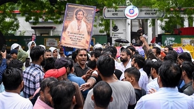 Supporters of Hindutva influencer Swatantra Bhardwaj stage a protest outside Parliament Street police station following his detention. (PTI) Supporters of Hindutva influencer Swatantra Bhardwaj stage a protest outside Parliament Street police station following his detention. (PTI)