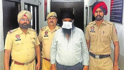 Manjit Singh Bedi in the custody of Jalandhar police on Friday.