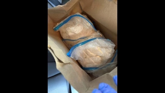 More than 40 pounds of methamphetamine as well as firearms and more than $10,000 ( ₹9.4 lakh) in cash were seized from Kawal Preet Singh’s apartment. (Department of Justice)
