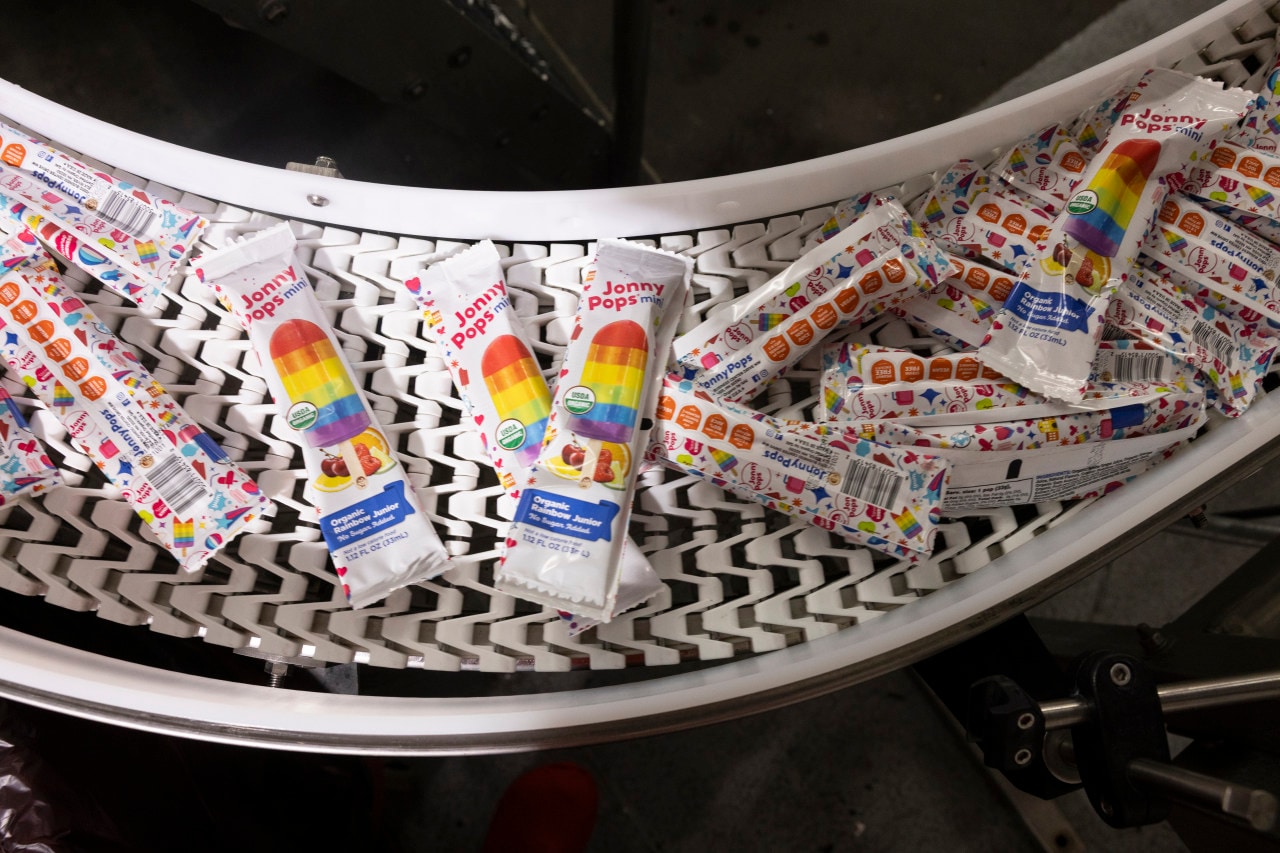 Organic Rainbow Junior pops on a conveyor belt at the company’s facility in Elk River, Minn. Organic Rainbow Junior pops on a conveyor belt at the company’s facility in Elk River, Minn.