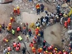 Drone view of the building collapse site in Satya Niketan of Delhi's South-West district, in New Delhi on Sunday. Rescue operations underway