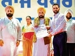 Addressing the gathering, Mann said the AAP government had earmarked  <span class='webrupee'>₹</span>1,744 crore for the promotion of sports. (HT)