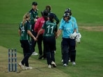 England's Alice Capsey shakes hands with Ireland's Arlene Kelly. 