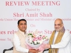 Panaji, Sep 06 (ANI): Union Home Minister Amit Shah being felicitated by Goa Chief Minister Pramod Sawant during a review meeting on the issues relating to the state of Goa, in Panaji on Sunday. (@PIBHomeAffairs X/ANI Photo) (@PIBHomeAffairs X)