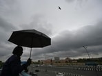 Gram it: Dark clouds hover over the skies at Akshardham Temple in Delhi. While Sunday saw ample rainfall, especially during the morning hours, the India Meteorological Department has issued a forecast of very light to light rain at many places with moderate rain at isolated places for today. 