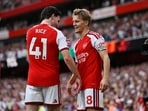 Arsenal's Martin Odegaard celebrates scoring their second goal with Declan Rice 