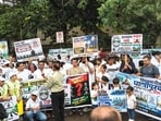 The silent march began at Infosys Circle in Phase I, proceeded to Shivaji Chowk and returned to the starting point. (HT PHOTO)