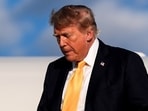 US President Donald Trump disembarks Air Force One at Morristown Airport in Morristown, New Jersey.