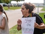 Demonstrators call for a first degree murder verdict as they protest outisde the courthouse during the jury deliberation phase of Lindsay Clancy's murder trial at the Plymouth County Superior Court in Plymouth, Massachusetts, on September 2, 2026. Photo by JOSEPH PREZIOSO / AFP)