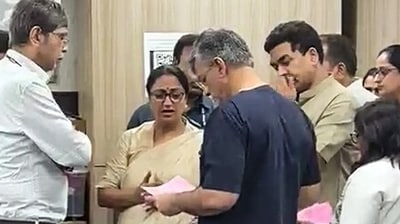 Delhi Chief Minister Rekha Gupta speaks with doctors and health officials at the AIIMS Trauma Centre and takes stock of the health condition of individuals who have been brought here after being rescued from the Satya Niketan building collapse site, in New Delhi on Sunday. (ANI Video Grab)