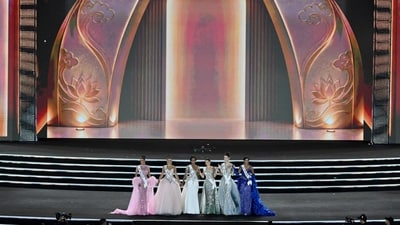 Top 6 participants stand on the stage during the grand finale. (AFP) Top 6 participants stand on the stage during the grand finale. (AFP)
