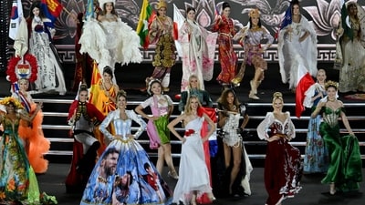 The dresses featured motifs, symbols, fabrics and silhouettes that represented the rich cultural heritage of their respective countries. (AFP) The dresses featured motifs, symbols, fabrics and silhouettes that represented the rich cultural heritage of their respective countries. (AFP)