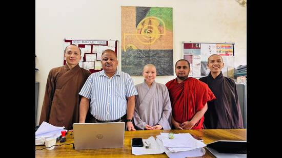 Buddhist students at LU with director International Cell prof RP Singh (HT Photo)