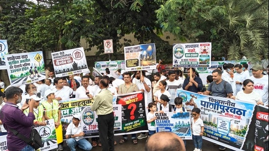 The silent march began at Infosys Circle in Phase I, proceeded to Shivaji Chowk and returned to the starting point. (HT PHOTO)