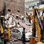 New Delhi, Sep 06 (ANI): JCB machines carry out rescue operations at the site of a building collapse at Satya Niketan in South-West Delhi, in New Delhi on Sunday. (ANI Photo/Riti Sharma)