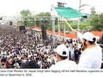 Haryana chief minister Nayab Singh Saini flagging off a marathon in Rewari on Sunday.