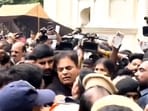 Bharat Rashtra Samithi (BRS) Working President KT Rama Rao scuffles with police personnel as he is detained along with party leaders during a protest outside the Telangana Assembly